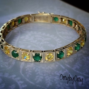 Idde de Orula massief 14 kt gouden armband met echte smaragd en gele topaas.  Uniseks Orunla Ifa - Santeria
