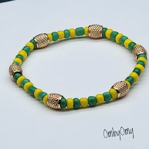 Ilde de Orula massief 14 kt gouden armband. elastische armband van de Yoruba-religie