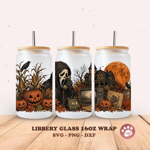 May include: Three frosted glass tumblers with bamboo lids and metal straws, featuring a Halloween-themed wrap design with a masked figure, a rotary phone, a haunted house, a large orange moon, jack-o'-lanterns, corn stalks, and a black crow.