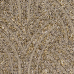 May include: A close-up of a textured fabric with a pattern of curved lines in a light brown and beige color.