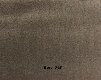 May include: A close-up of a textured, light brown fabric swatch with the text "BUFF 745" printed on it.