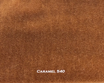 May include: Close-up of a brown fabric swatch with the text "CARAMEL 540" printed on it.