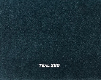 May include: A close-up of a dark teal fabric swatch with the text "TEAL 285" printed on it.