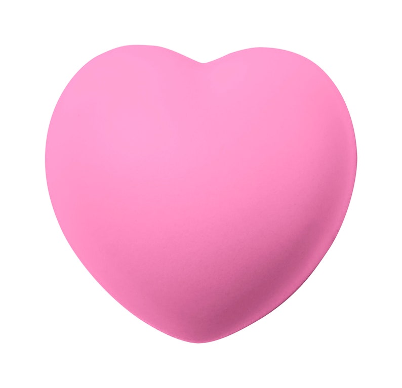 K&ouml;nnte beinhalten: Ein rosa herzf&ouml;rmiges Objekt aus weichem, weichem Material.