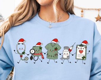 Christmas Nurse Sweatshirt Doodle Holiday RN Shirt Cute Medical Staff Xmas Top Nursing Student Gift Festive Nurse TShirt Group Team Matching