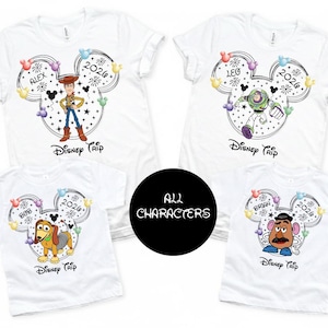 four Disney-themed t-shirts, each featuring a different character from the Toy Story franchise. The t-shirts are arranged in a square formation, with each one displaying a unique character from the series.