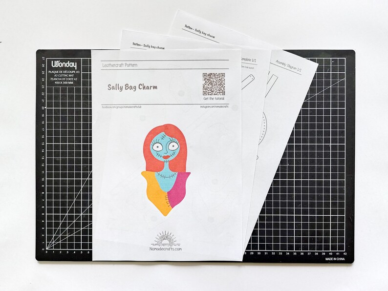 May include: A printable leathercraft pattern for a Sally bag charm. The pattern features a cartoon illustration of Sally from the Nightmare Before Christmas. The pattern includes a QR code that says "Get the tutorial".