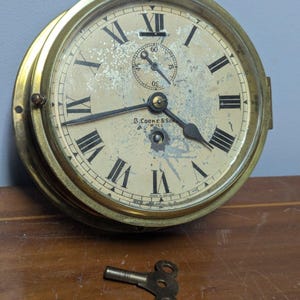 1920&#39;s Ship Bulkhead Nautical 8 Day Brass Clock Cooke & Son.D Works