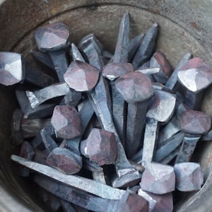 Hand Forged Blacksmith Made Pack of Four Rosehead Nails