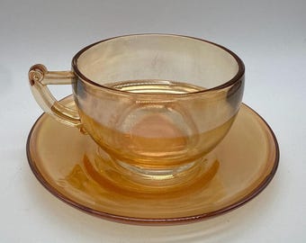 Taza/platillo para ponche Jeanette Glass Moderne - Cristal iridiscente Marigold Carnival - C. 1940-1950