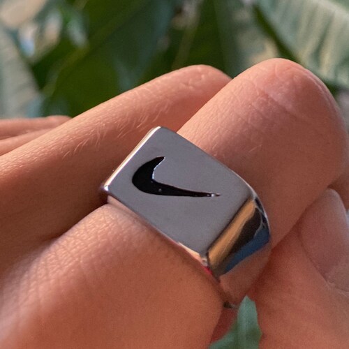 nike swoosh ring