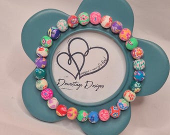 Frame, Teal Flower inspired small bead design on a 3" diameter standing frame