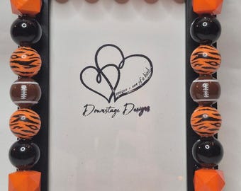 Frame, Cinncinati Bengals inspired large bead vertical design on a 4x6 black frame