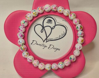 Frame, "pink floral" inspired small bead design on a 3" diameter pink frame