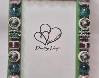 Frame, Philadelphia Eagles inspired large bead vertical design on a 4x6 green frame
