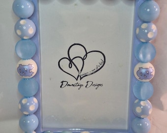 Frame, "North Carolina TarHeels" inspired large bead design on a 4x6 light blue frame