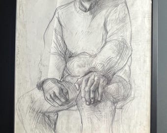 May include: A framed pencil drawing of a man sitting with his hands in his lap. The drawing is in shades of grey and is on a white background.