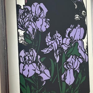 Amethyst is a famous Art Nouveau lithograph created by the Czech artist Alphonse Mucha in 1900. It is one of four works in his acclaimed "The Precious Stones" series, where each panel features a woman personifying a specific gemstone.