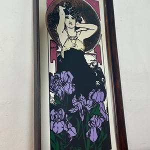 Amethyst is a famous Art Nouveau lithograph created by the Czech artist Alphonse Mucha in 1900. It is one of four works in his acclaimed "The Precious Stones" series, where each panel features a woman personifying a specific gemstone.
