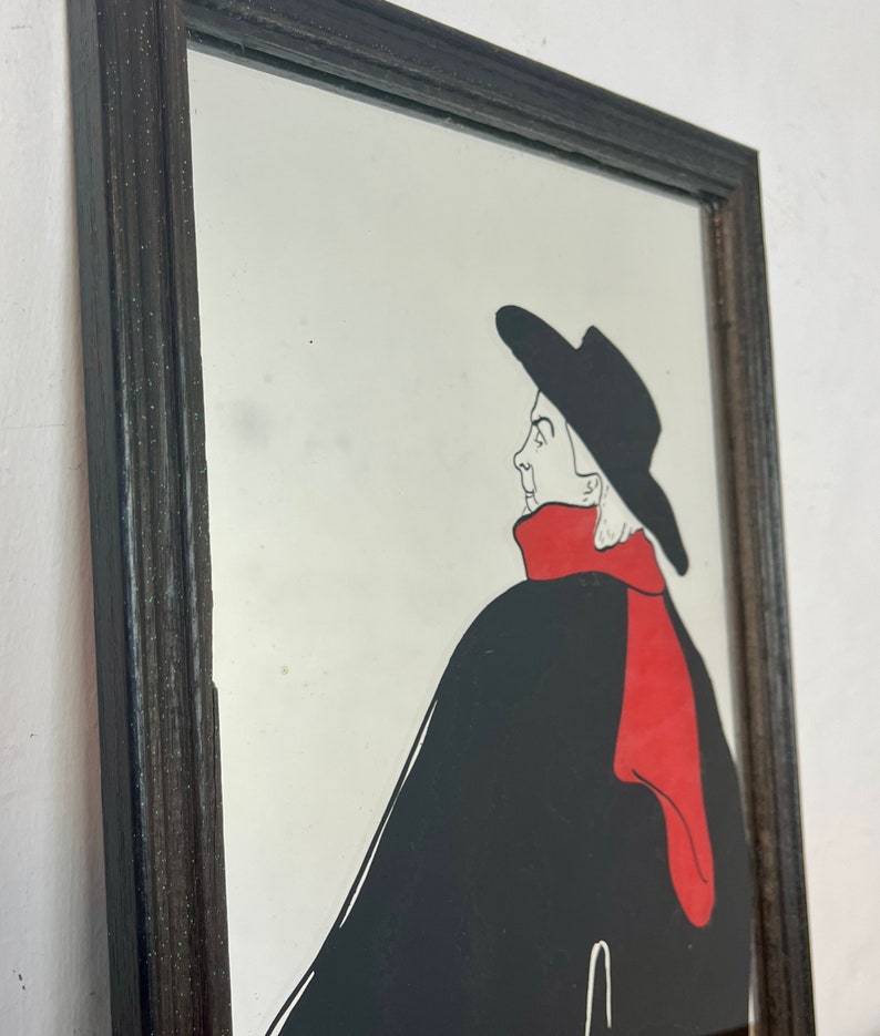 Stunning vintage wall art mirror featuring the famous cabaret star now in a gallery at San Diego Museum of Art, with vivid tones with wide brimmed hat and scarf creating a classic Lautrec art nouveau design.