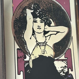 Amethyst is a famous Art Nouveau lithograph created by the Czech artist Alphonse Mucha in 1900. It is one of four works in his acclaimed "The Precious Stones" series, where each panel features a woman personifying a specific gemstone.
