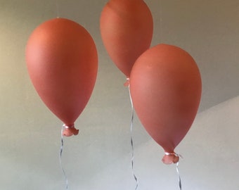 Glass balloon, trend color “Positive blush” 2022.