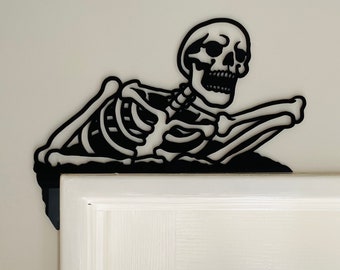 Skeleton door frame art