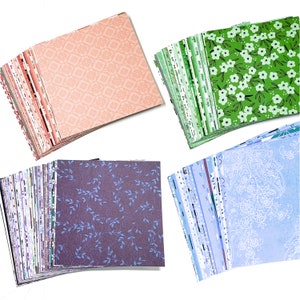 May include: A set of 100 sheets of patterned paper in various colors and designs, including floral, geometric, and abstract patterns. The paper is perfect for scrapbooking, card making, and other paper crafts.