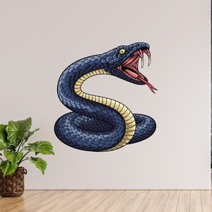 May include: A coiled, stylized illustration of a blue snake with an open mouth, revealing fangs and a red tongue. The snake's body has a yellow underbelly. The image is set against a white wall, with a glimpse of a modern living room in the background.