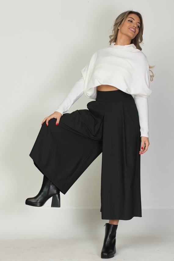 Ultra trendy skirt pants in black color, front practical pockets, concealed zip fastening, All season leg skirt, Wide leg palazzo pants