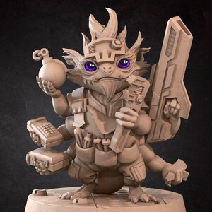 May include: A detailed figurine of a fantasy creature with purple eyes, holding a bomb, wrench, and futuristic weapon. The creature has multiple arms and wears a utility belt. The base of the figurine has the text "Bite the Bullet".