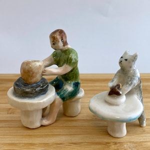 Miniature Ceramic Cat Potter Figurine: Handmade Porcelain Micro-Sculpture