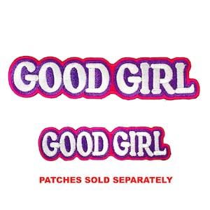 May include: Two embroidered patches featuring the text GOOD GIRL in white letters with a purple outline and a bright pink border. The patches are displayed one above the other, with the text PATCHES SOLD SEPARATELY appearing in red below them.