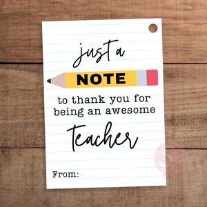 May include: A rectangular white gift tag with horizontal blue lines resembling notebook paper. It features a yellow pencil graphic and black text that reads: just a NOTE to thank you for being an awesome Teacher. The word From: is at the bottom.