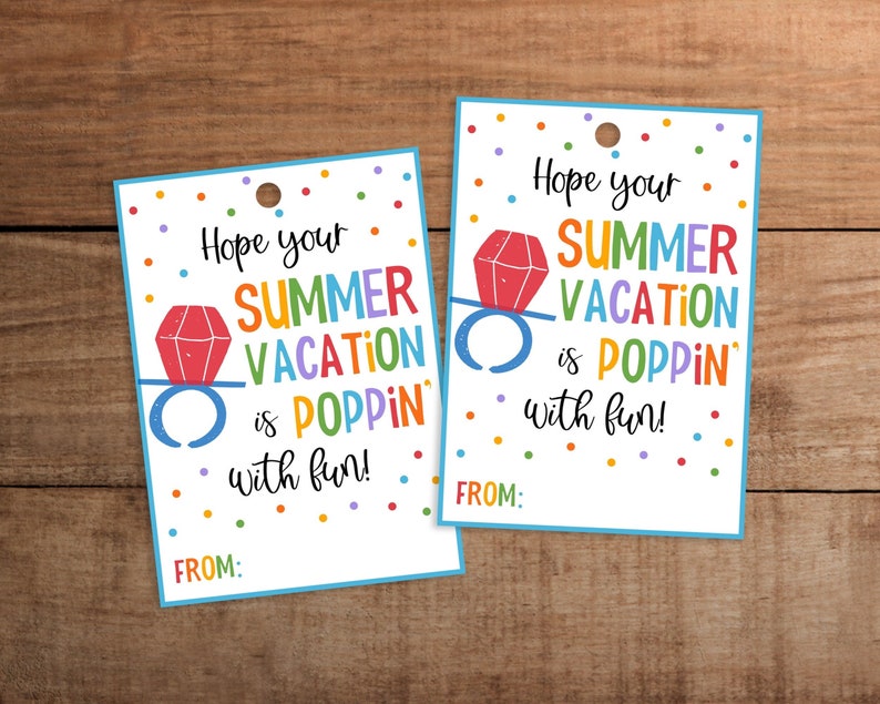 May include: Two gift tags with a blue border and the text "Hope your SUMMER VACATION is POPPIN' with fun!" in colourful letters. Each tag features a ring graphic and colourful confetti.