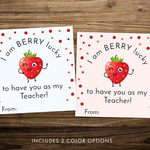 May include: Two printable teacher appreciation cards featuring a cartoon strawberry with the text "I am BERRY lucky to have you as my Teacher!" One card has a white background with red and orange polka dots, the other has a pink background with red and orange polka dots.