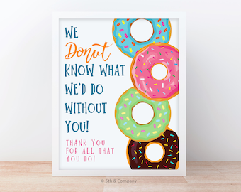 May include: A framed print featuring four colorful donuts with sprinkles. The text reads "We Donut Know What We'd Do Without You!" in a playful font. A thank you message is also included. The donuts are blue, pink, green, and brown.