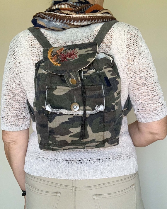 camo convertible mini backpack Upcycled Camouflage Denim Convertible Backpack, Embroidered Detail