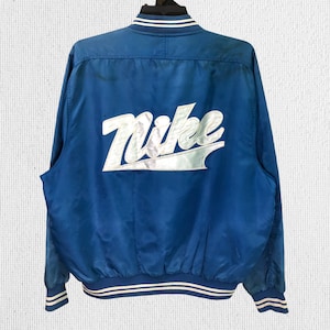 Vintage Sunfaded Nike Varsity Jacket