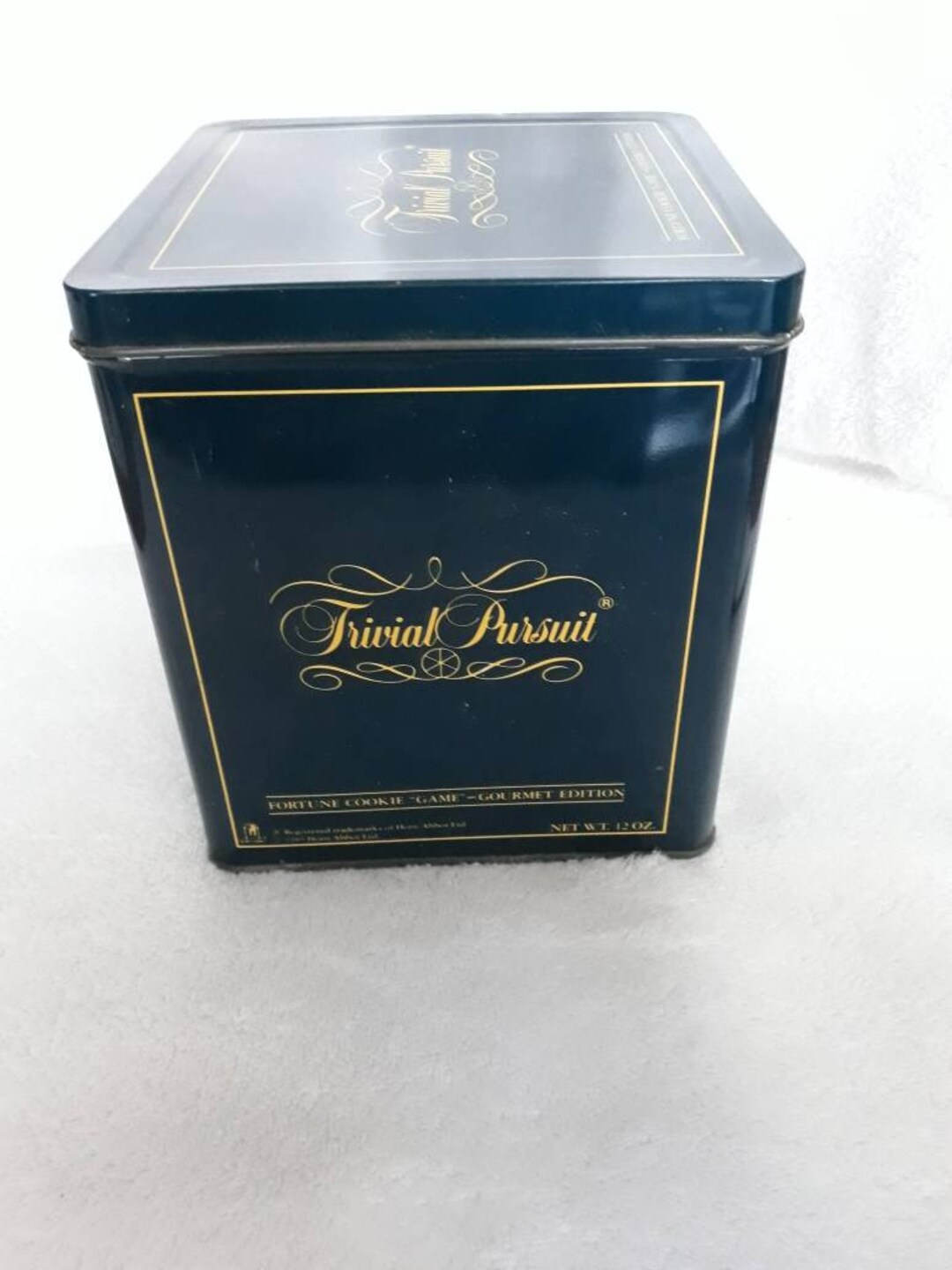 Trivial Pursuit fortune Cookie Game Tin With Game Card Directions and Answers to Fortune Cookie