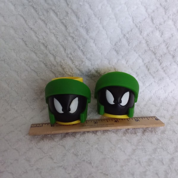 Two Marvin Martian demi cups of plastic set in rubber head.  Iconic looney tunes vtg brand. Must have collectible or fun gift.