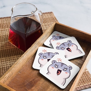 Illustrazione di criceto domestico Emote carino Emote kawaii Emote dei cartoni animati Sottobicchieri di sughero Sottobicchieri da caffè