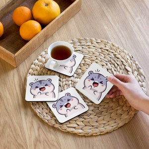 Illustrazione di criceto domestico Emote carino Emote kawaii Emote dei cartoni animati Sottobicchieri di sughero Sottobicchieri da caffè
