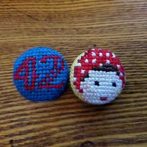 Rosie the Riveter crossstitch pins.