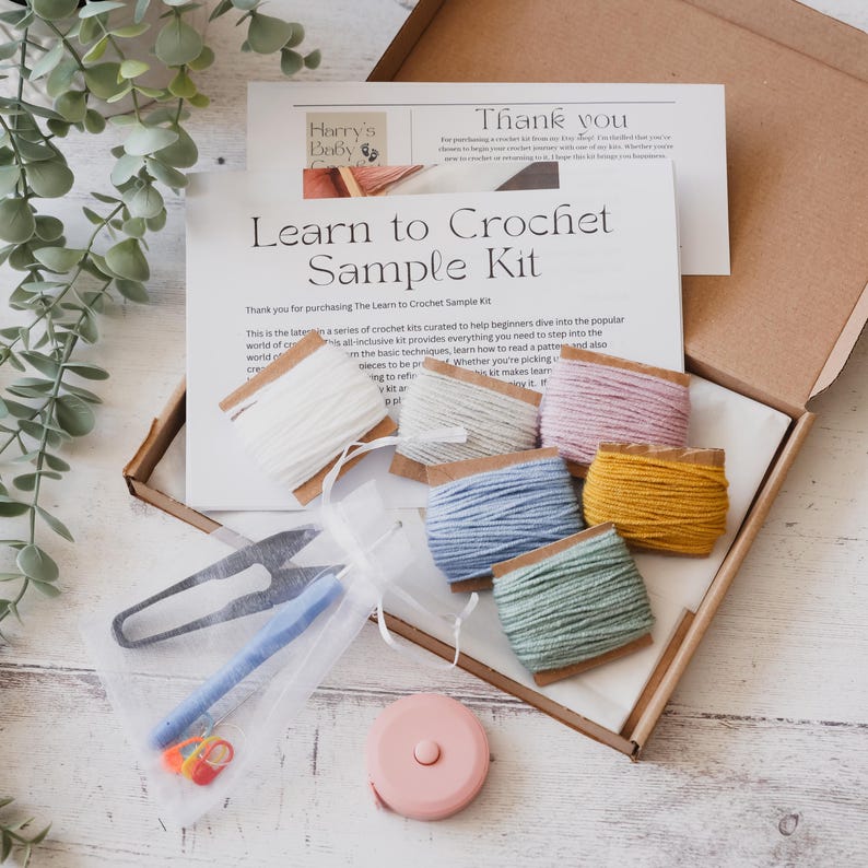 May include: Learn to Crochet Sample Kit with yarn, crochet hook, scissors, measuring tape, and safety pins. The kit includes instructions to help beginners learn how to crochet.