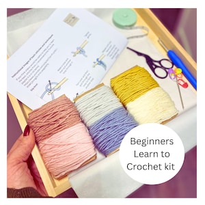 Sample beginners learn to crochet kit. Complete with over 120 metres of yarn, craft scissors, hook, tape measure and PDF instructions.