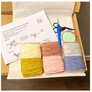 Sample beginners learn to crochet kit. Complete with over 120 metres of yarn, craft scissors, hook, tape measure and PDF instructions.