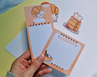 white dog in bakery memo pad to do list || spitz samoyed pomeranian || fluffy cloud cafe
