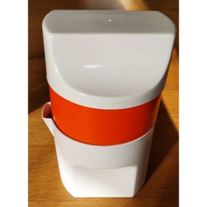 70s plastic citrus juicer, vintage white and orange orange juicer
