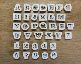 Lettere dell&#39;alfabeto e taglierini per numeri alti 1/2&quot; (1,3 cm).